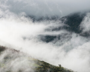 Naklejka na ściany i meble Spacious valleys filled with morning mist