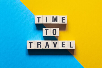 Time to travel - word concept on cubes,text