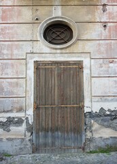 An old wooden door in a stone house