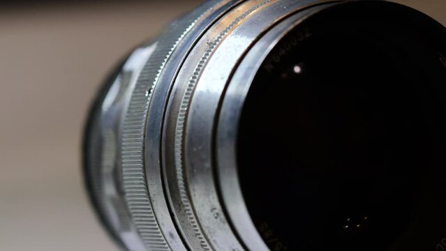 old vintage lens rotates in a circle. High quality 4k footage