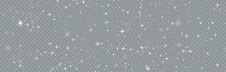 Particles of white magic dust. Shining light particles.Christmas glitter particles. Light effect on a transparent background