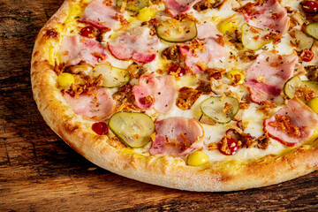 pizza with ham and pickles