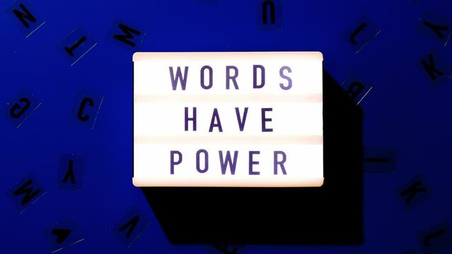4k zoom in out Lightbox with text WORDS HAVE POWER. Motivational Words Quotes Concept. Colorful background. Minimalistic creative concept.
