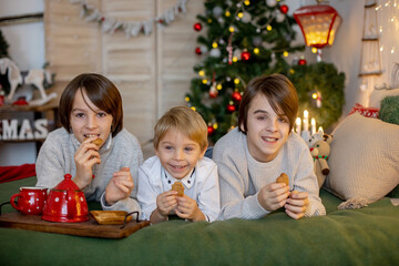 Christmas family picture in cozy home with lights and decoration