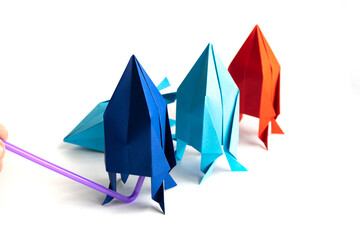 paper rocket on a white background. origami.paper craft