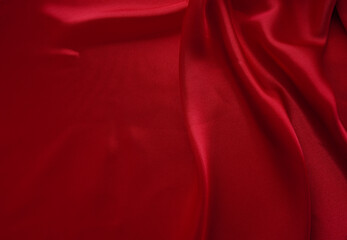 red fabric texture empty as waves (spot focus)