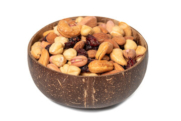 Mixed nuts in bowl isolated on white background. Nuts, cashews, almonds and pistachios in a coconut bowl. close up