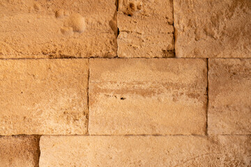 Remains of an ancient handcrafted wall. grunge texture. abstract background.