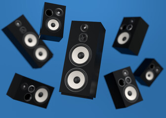 Set of Hi-fi speakers with loudspeakers for sound recording studio on blue.