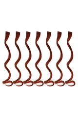 Close-up shot of a clip-in set of 7 wavy red strands (tresses) for hair extensions. The fake hair strands are isolated on a white background. Front view.