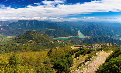 Great panoramic view of the Baells reservoir and the Catllaras and Picacel mountains from the Figuerassa viewpoint, Bergueda, Catalonia, Spain