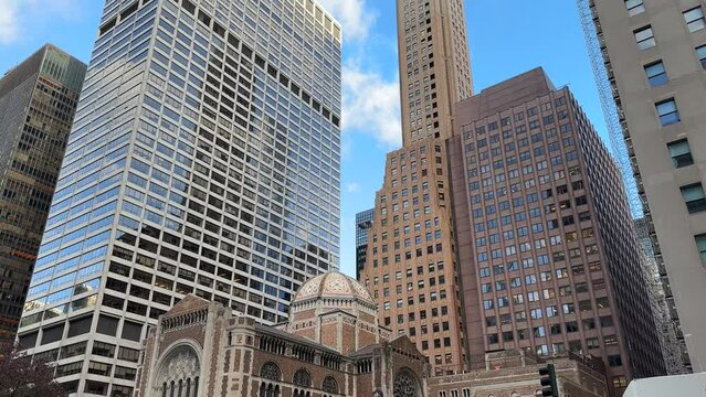 St. Bartholomew's Episcopal Church and Midtown Manhattan Skyscrapers, New York. National Historical Landmark and Modern Buildings, Street View