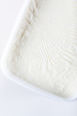 Traditional creamy yogurt. Turkish and Greek traditional dairy food yoghurt or yogurt in a white bowl.