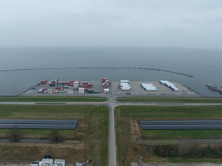 Fototapeta na wymiar Lelystad, 3th of December 2022, The Netherlands. CTU Flevokust. Inland storage and transhipment terminal towards the port of Rotterdam and Antwerp. Small docking platform.