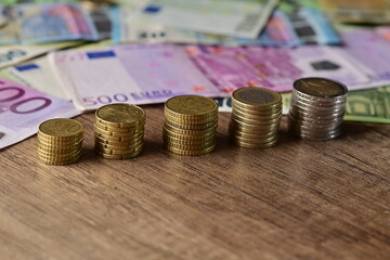 Different euro coins macro close up.A lot of euro coin money.Investing, trading and business enrichment.