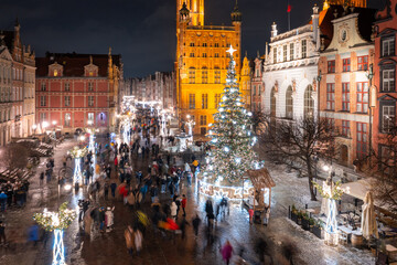 Christmas tree and decorations in the old town of Gdansk at dusk, Poland