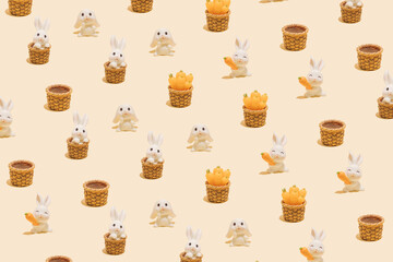 Seamless pattern made of little white rabbits on pastel background. Symbol of the Chinese New Year of the rabbit. Happy 2023 and good luck!