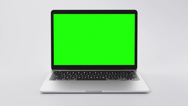 Modern thin Laptop with green display for product placement app visualisation, web interface or else.