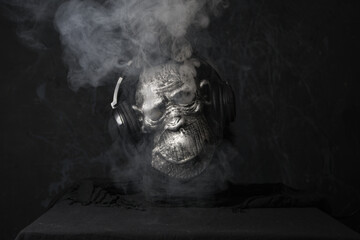 Gorilla wearing smoking headphones