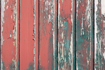 old wooden wall with cracked paint on it