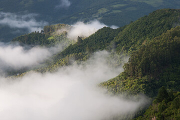 Beautiful view of the mountains with fog