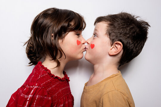 Cute kids kissing each other
