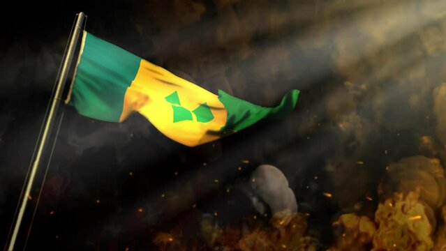 waving Saint Vincent and the Grenadines flag on smoke and fire with sun rays - disaster concept