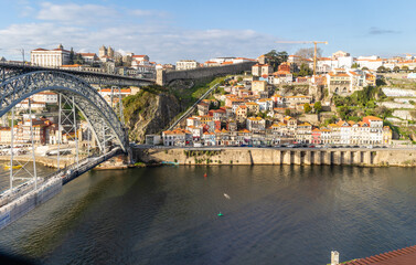 Fototapeta na wymiar Porto, Portugal - December 07, 2022: views of the don luis iron bridge in the city of porto, portugal