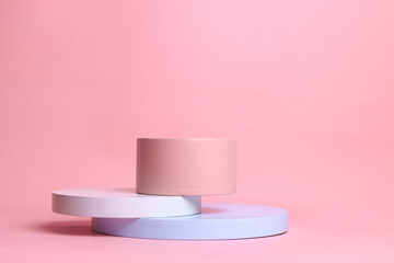 Colorful pastel round podium on pink background for products presentation or exhibitions. 