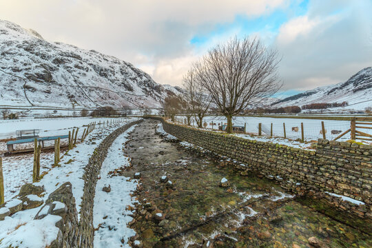 Winter Landscape With River And Snow In The Langdale Valley