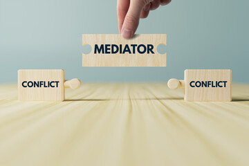 Wooden blocks, puzzles with the word conflict and a mediator that connects them. The concept of mediation, helping to resolve disputes, conflicts. - obrazy, fototapety, plakaty