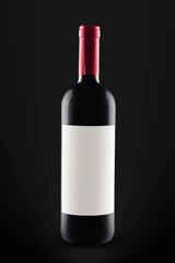 white label wine bottle on black background