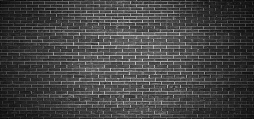 Black brick wall background, brick room, interior texture, wall background.