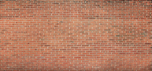 Red street brick wall background or texture