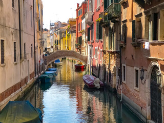 canal with ships in Venice