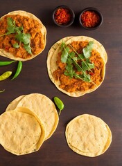 bunch of tortillas on a table