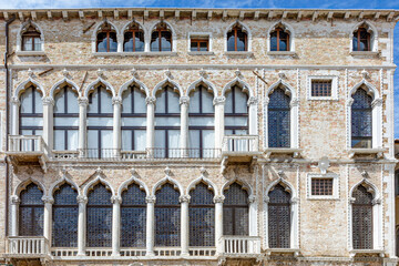 Fototapeta na wymiar facade of an old venetian palace with closed windows