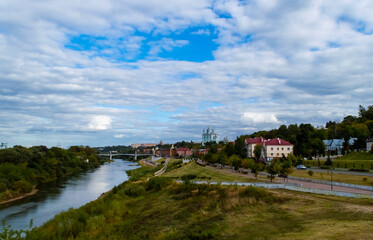 Fototapeta na wymiar View of the Smolensky Cathedral from afar. Cloudy weather. Dnepr River