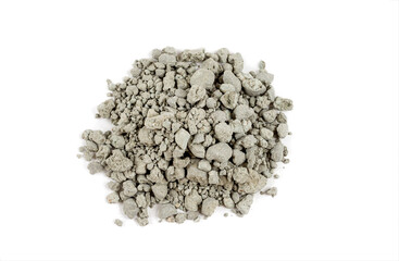 Pile of crushed green clay on a white background