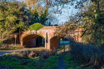 A view of an abandoned railway bridge near to Lubenham, UK in winter