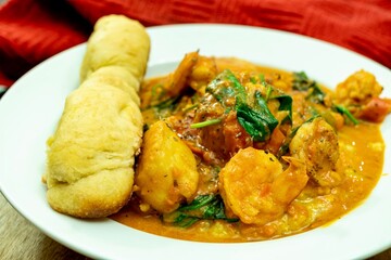 Shrimp and Grits (Polenta) and Scallops with a Twisted Yeast Roll Breadstick