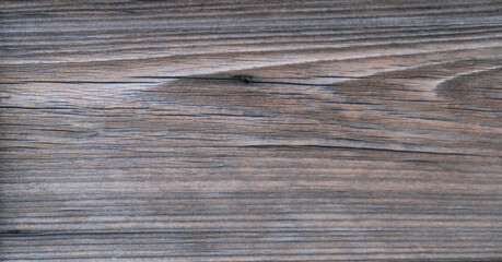 Fondo de madera vieja rústica de color marrón con dibujos alargados y textura rugosa