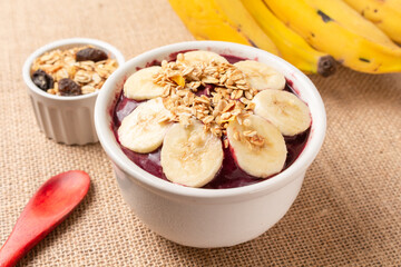 Açaí. Brazilian frozen acai with banana and granola.