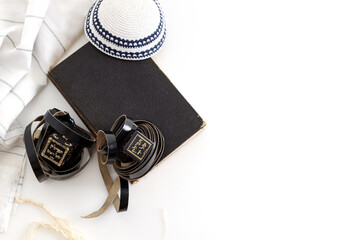 Tallit and tefillin and jewish Kippah yarmulke (hat)  on white background