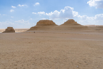 landscape of the Fayoum desert in Egypt, with the typical eroded rock formations