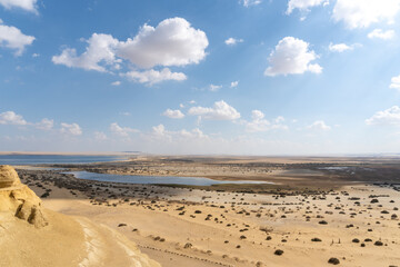 Faiyum desert oasis seen from the top of a rock formation.