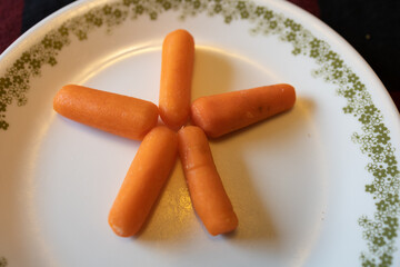 Baby Carrots spread out in a design