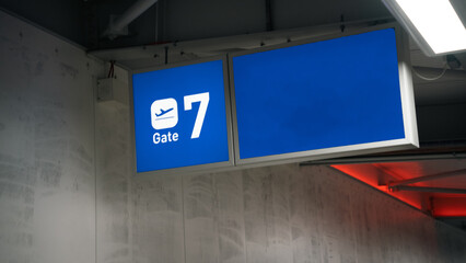 Airport Gate sign hanging from the ceiling