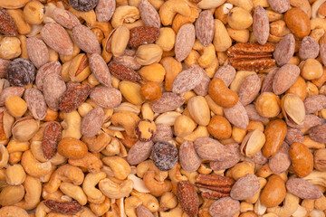 A group of almonds, pistachios, walnuts, macadamia, cashews.