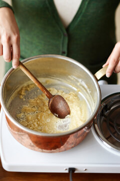 Woman Stirring Roux in Pot